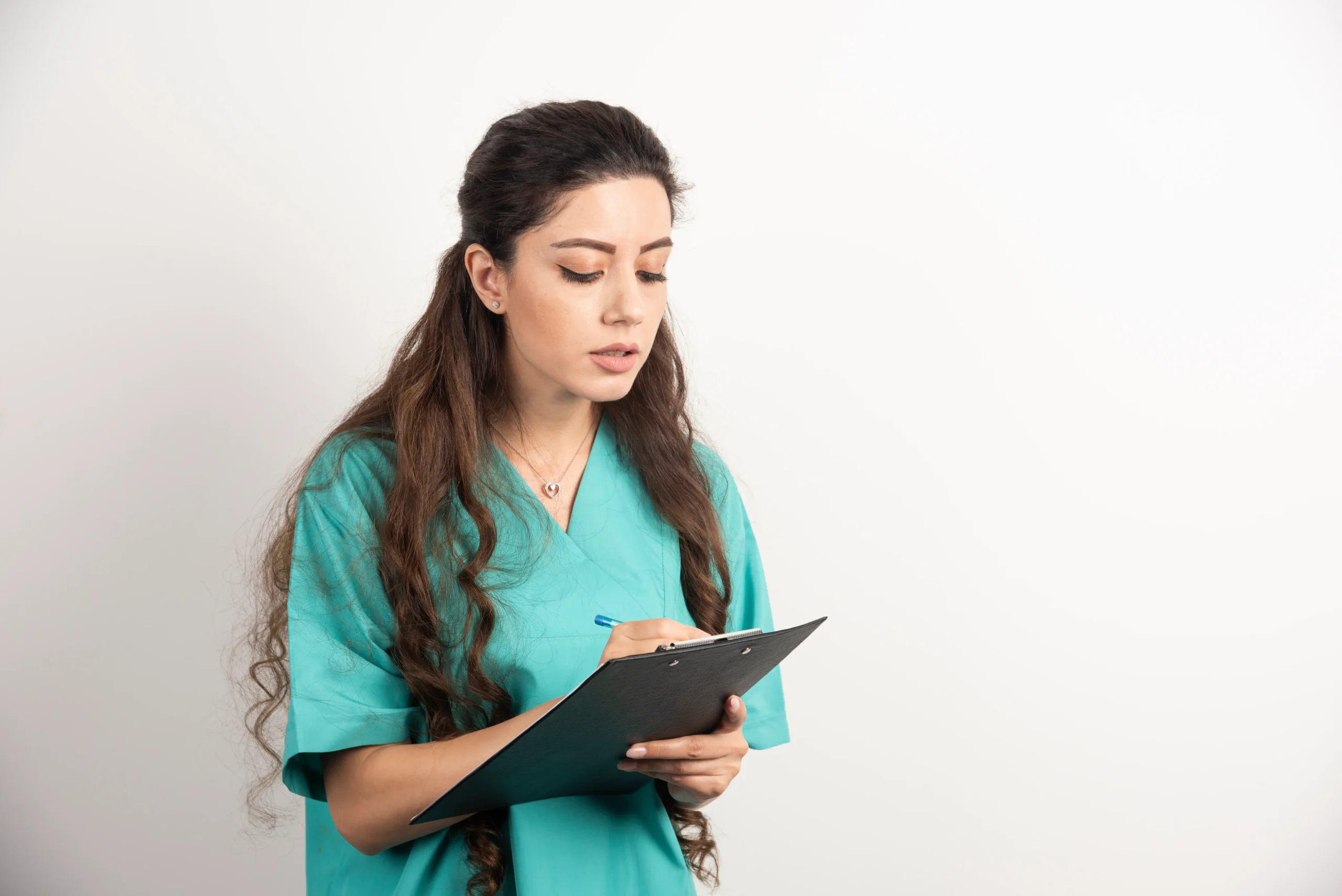 Female healthcare worker with clipboard